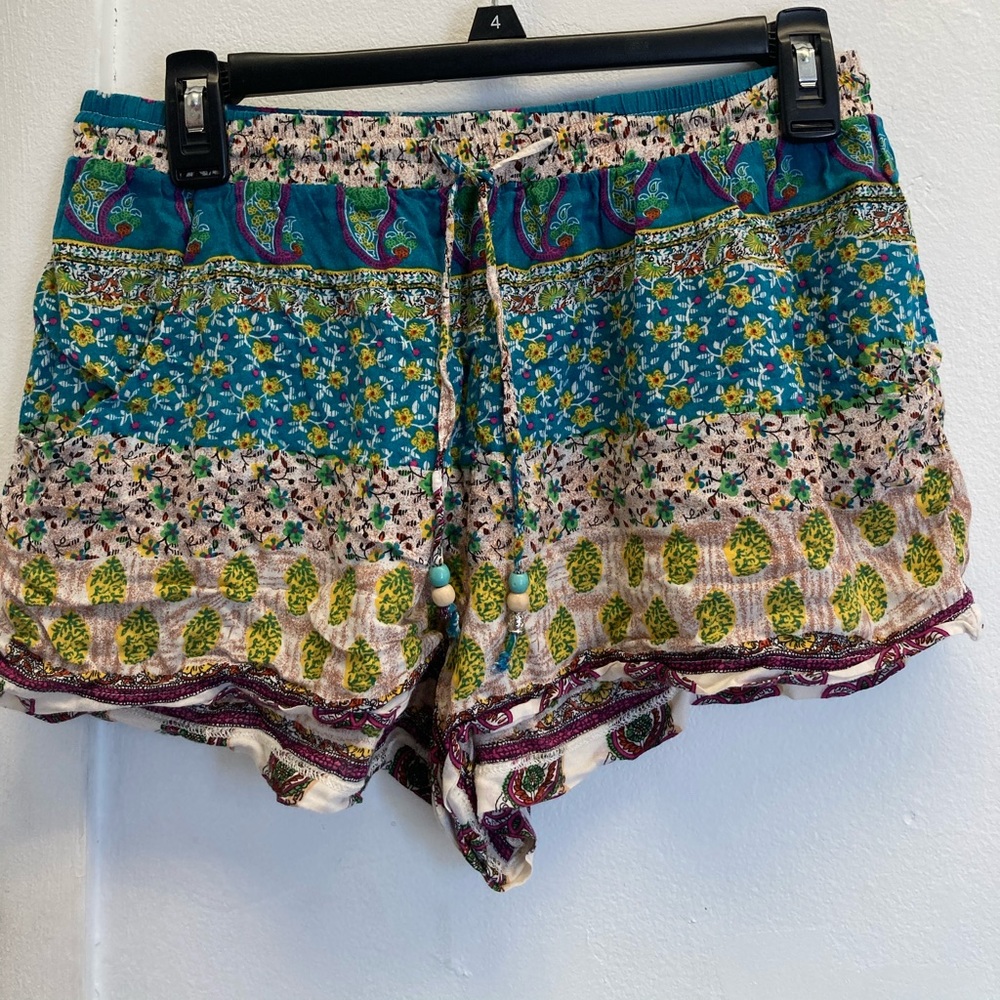 Floral shorts.